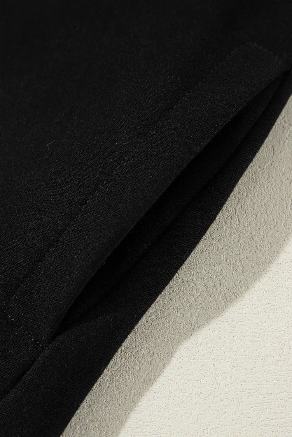 Black Solid O Neck High Low Hem Pullover Sweatshirt
