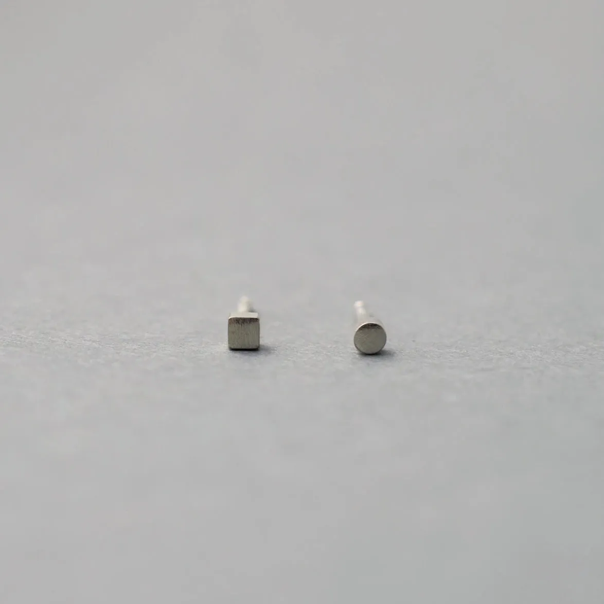 CIRCLE AND SQUARE STARDUST STUDS