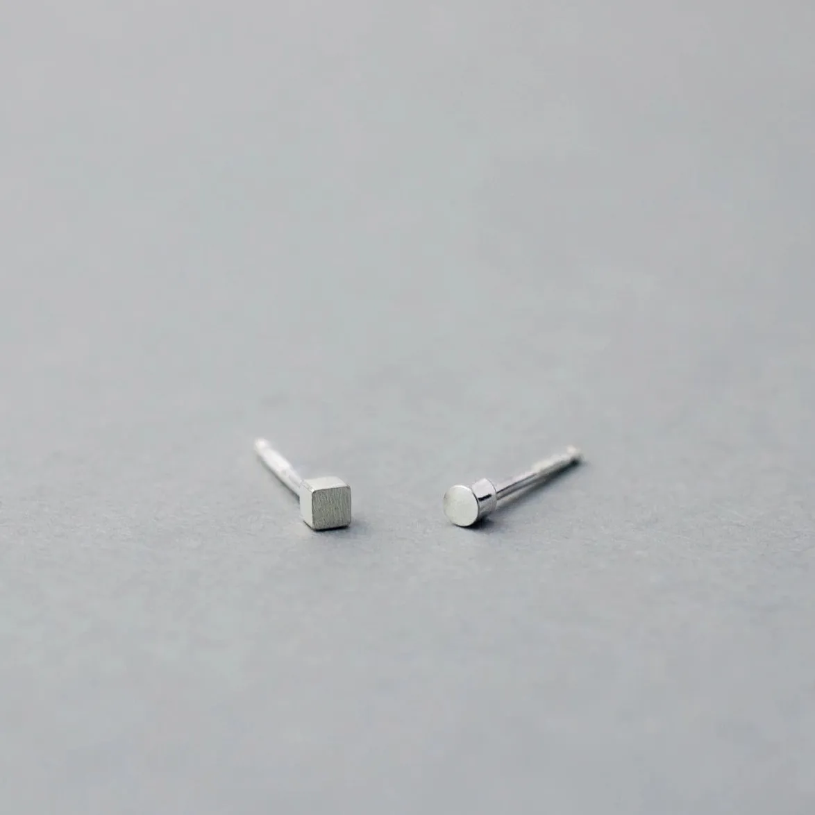 CIRCLE AND SQUARE STARDUST STUDS