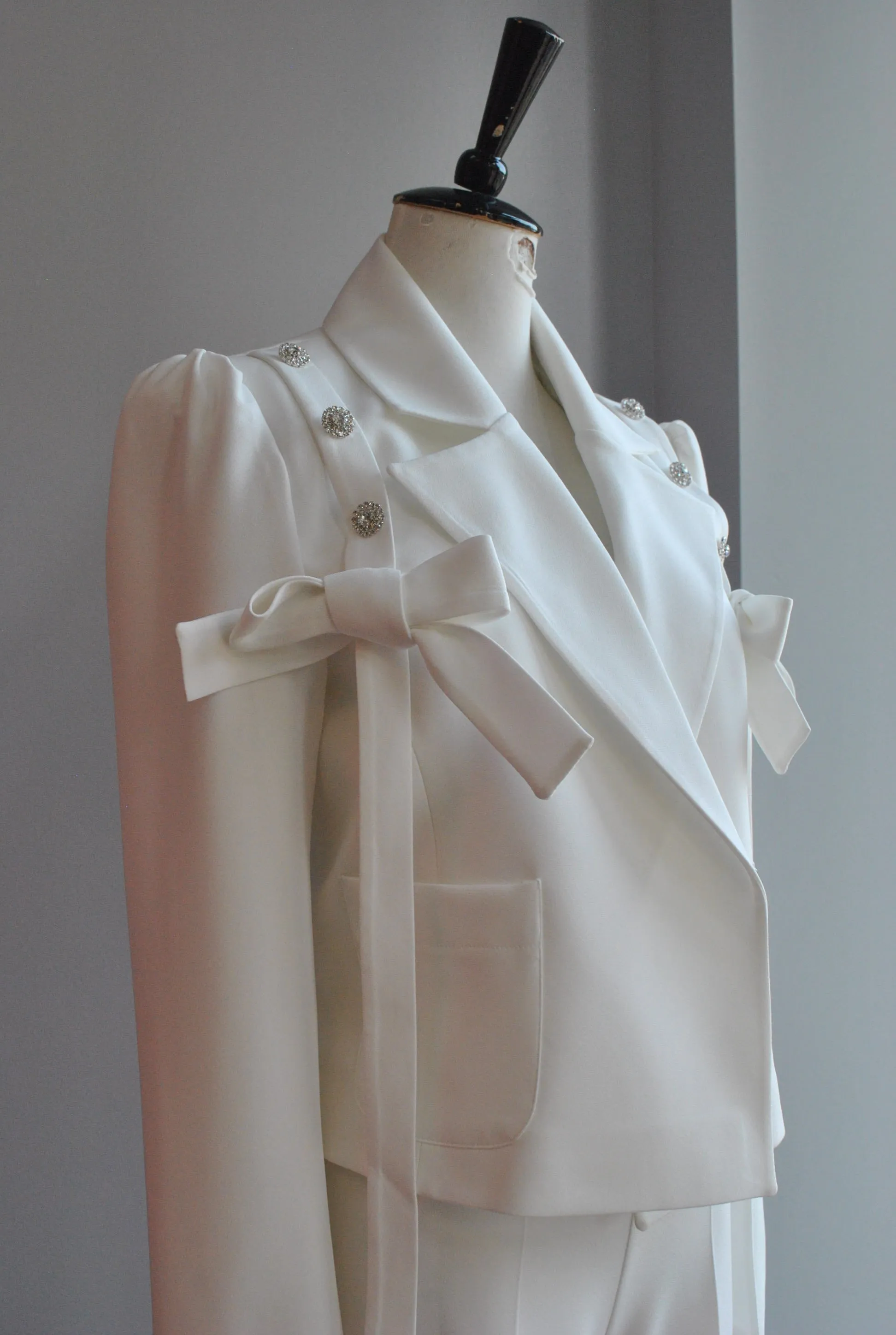 CLEARANCE - WHITE SUIT WITH BOWS AND CRYSTALS