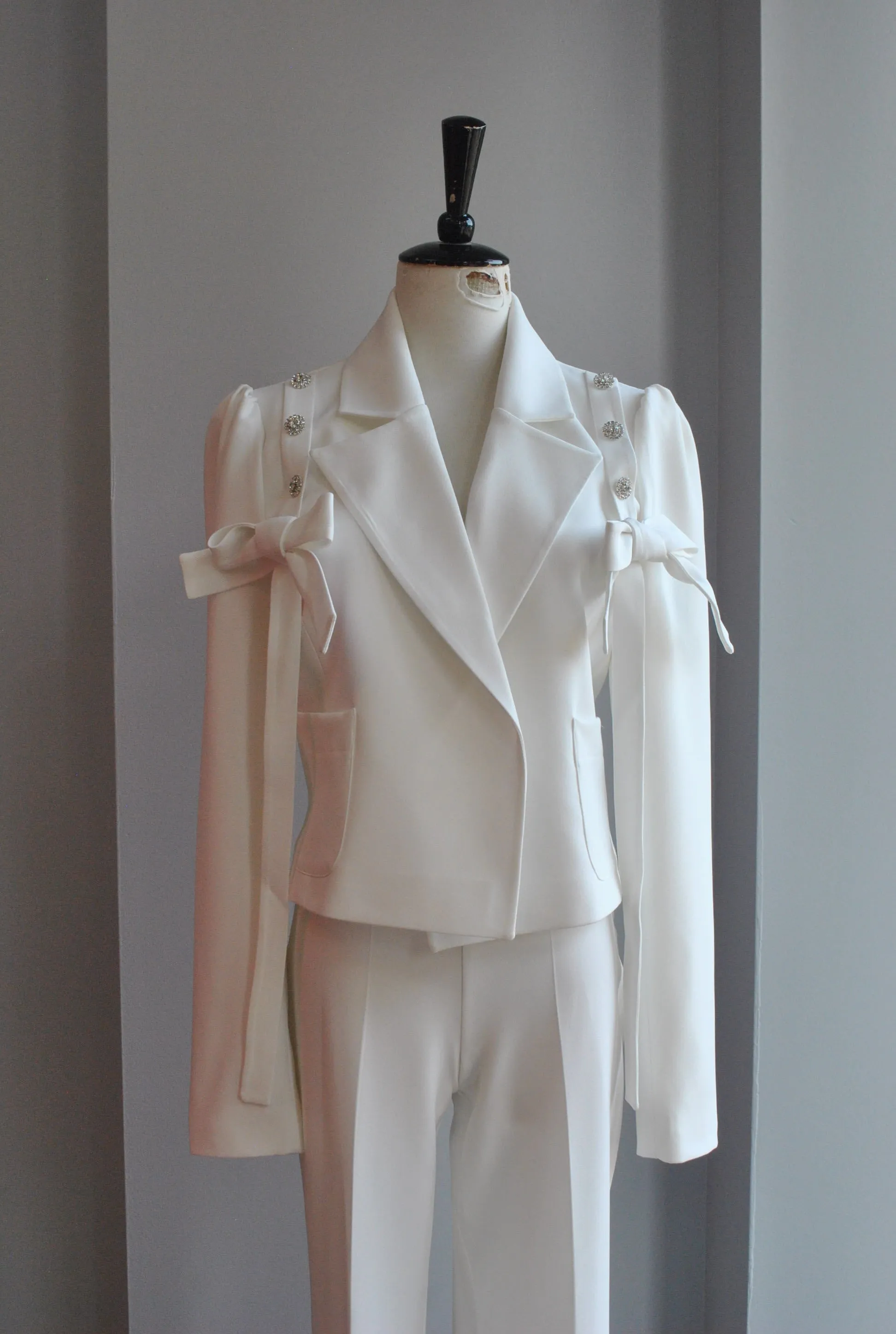 CLEARANCE - WHITE SUIT WITH BOWS AND CRYSTALS