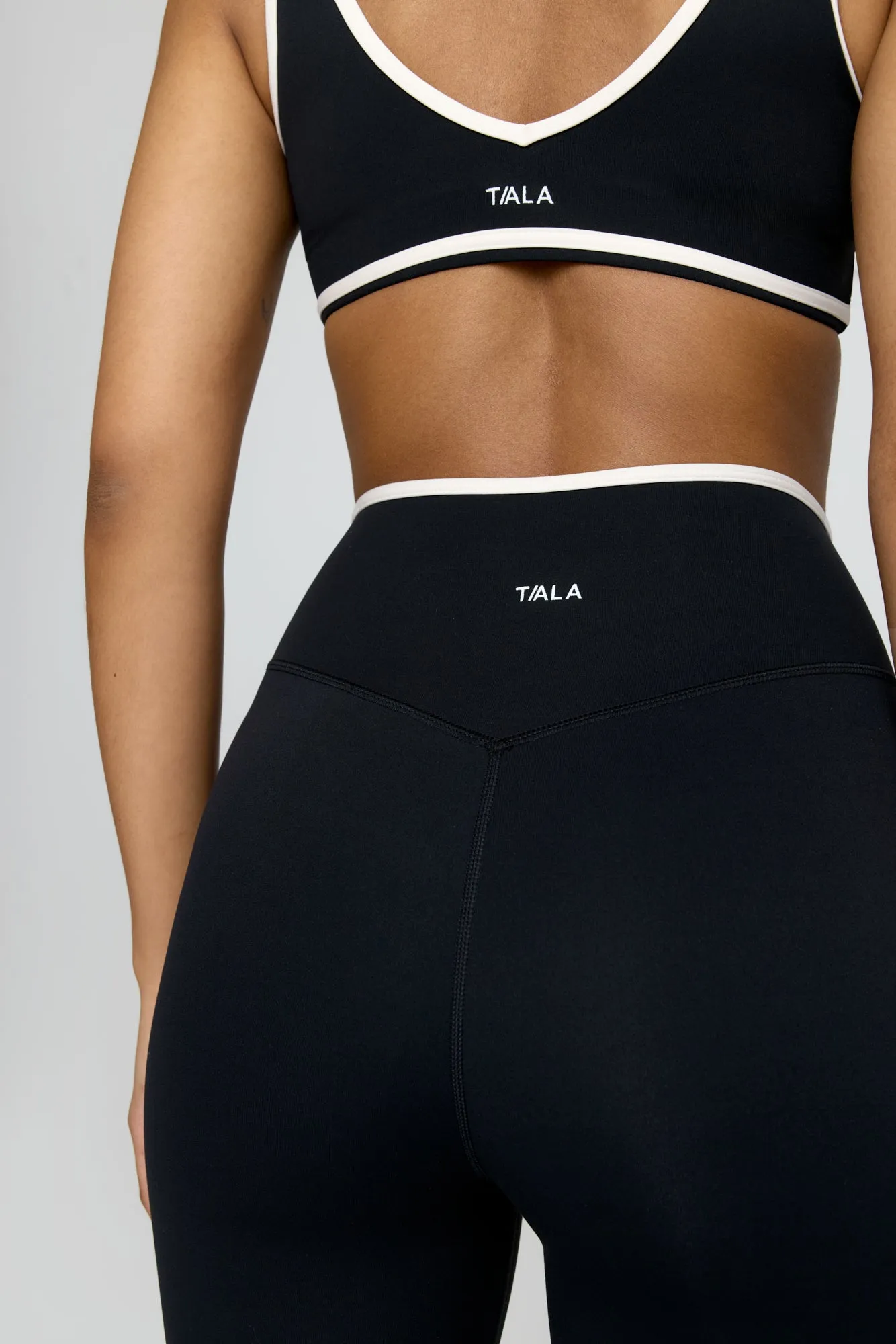 DayFlex Contrast Trim Wrap High Waisted Flared Yoga Pant - Shadow Black And Buttermilk