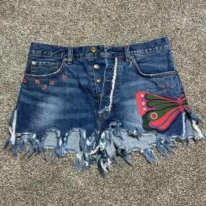 Free people cutoff Jean shorts fields of sun painted butterfly button fly summer