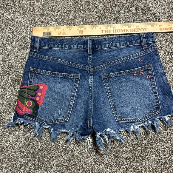 Free people cutoff Jean shorts fields of sun painted butterfly button fly summer