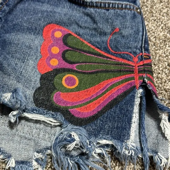 Free people cutoff Jean shorts fields of sun painted butterfly button fly summer