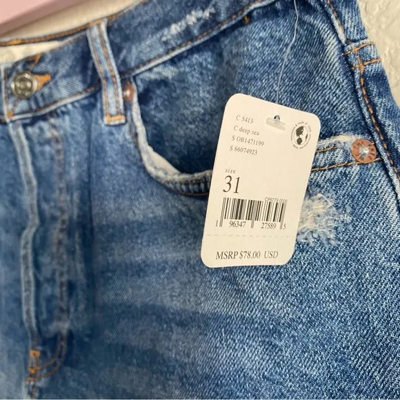 Free People Medium Wash Distressed Raw Hem Denim Shorts