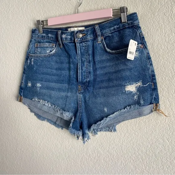 Free People Medium Wash Distressed Raw Hem Denim Shorts