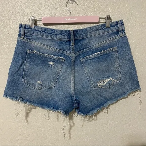 Free People We the Free Beach Bum Distressed Medium Wash Denim Shorts