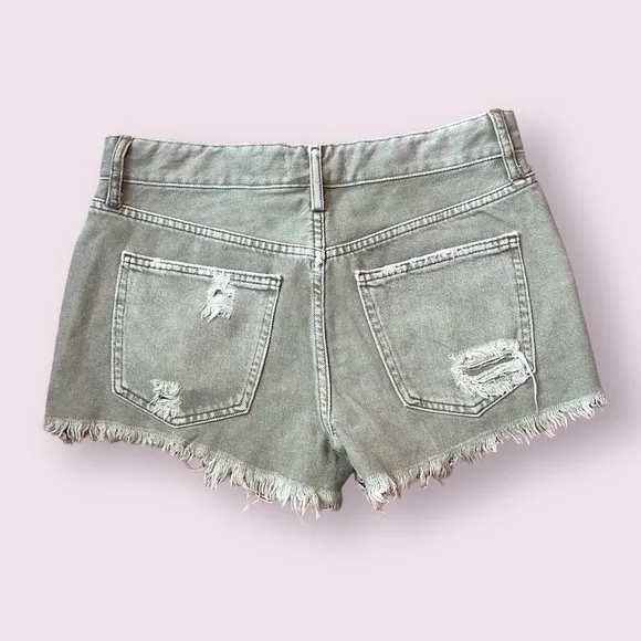 Free People We The Free green frayed hem denim shorts in size 28