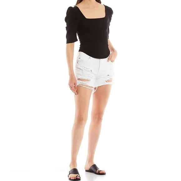 Free PeopleMaggie Mid Rise Frayed Hem Distressed Denim Shorts.