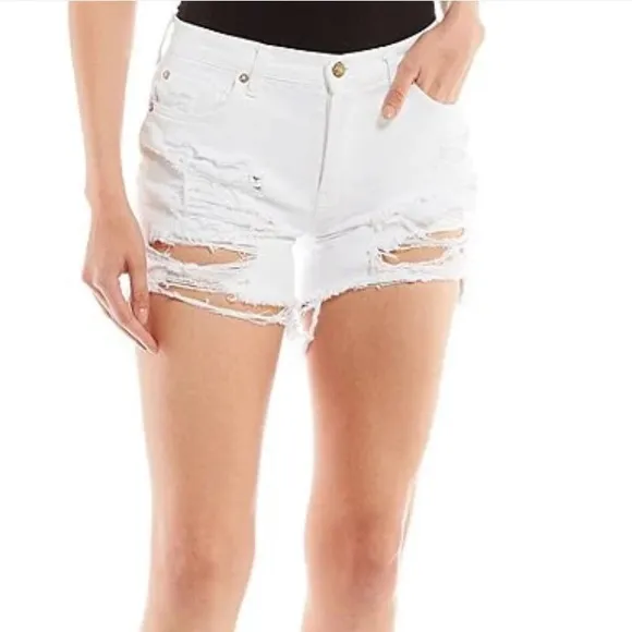 Free PeopleMaggie Mid Rise Frayed Hem Distressed Denim Shorts.