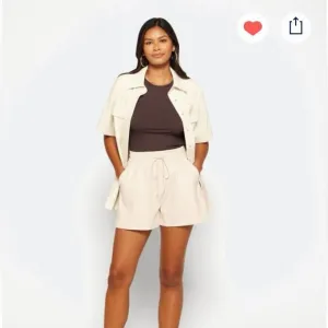 Good American better than leather High waisted shorts.