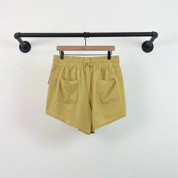 NWT Free People Movement Levitate High Rise Shorts in Honey Wheat