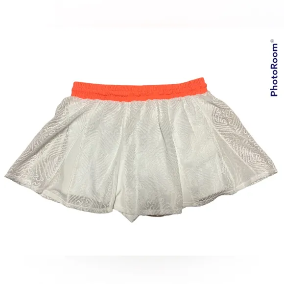 NWT FREE PEOPLE MOVEMENT white/coral skort. Size medium