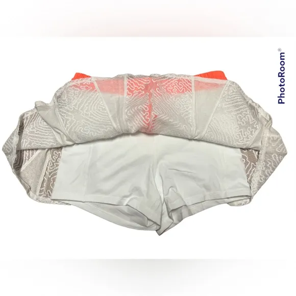 NWT FREE PEOPLE MOVEMENT white/coral skort. Size medium