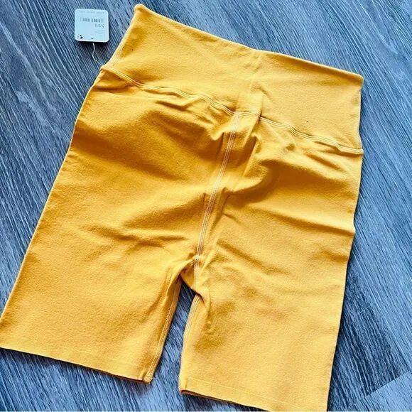 NWT Free People Blaze It Crossover Bike Shorts in Tumeric Yellow Gold M/L