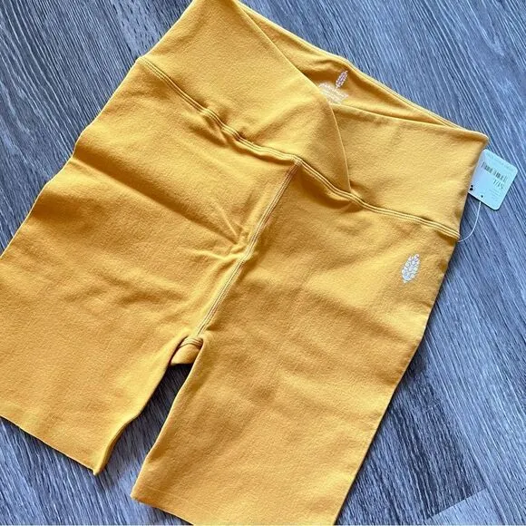 NWT Free People Blaze It Crossover Bike Shorts in Tumeric Yellow Gold M/L