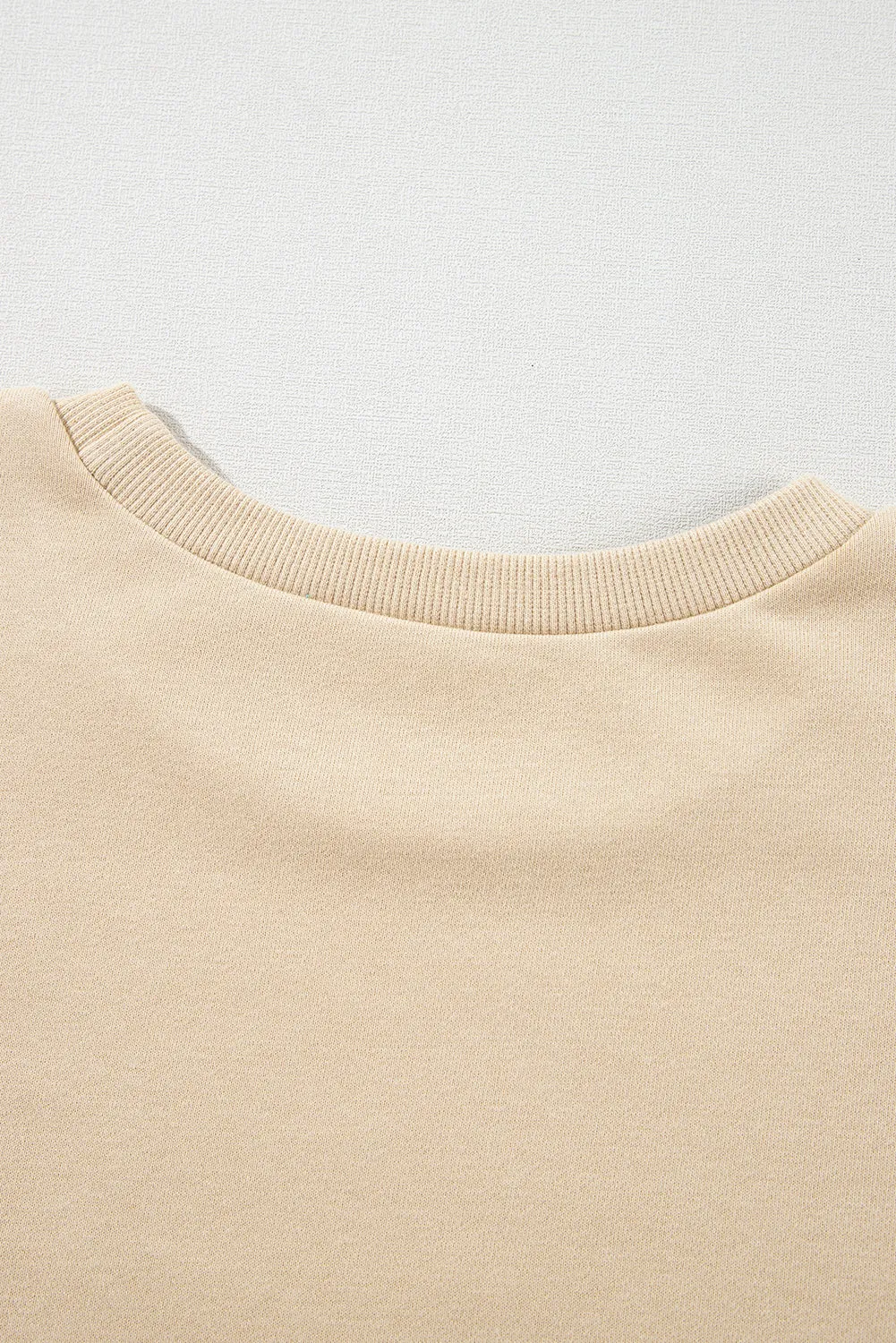Parchment Solid O Neck High Low Hem Pullover Sweatshirt