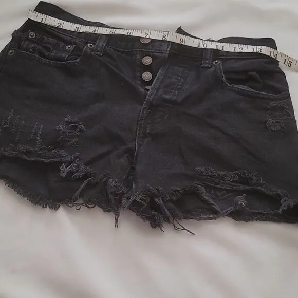 We the free black distressed shorts size 25
