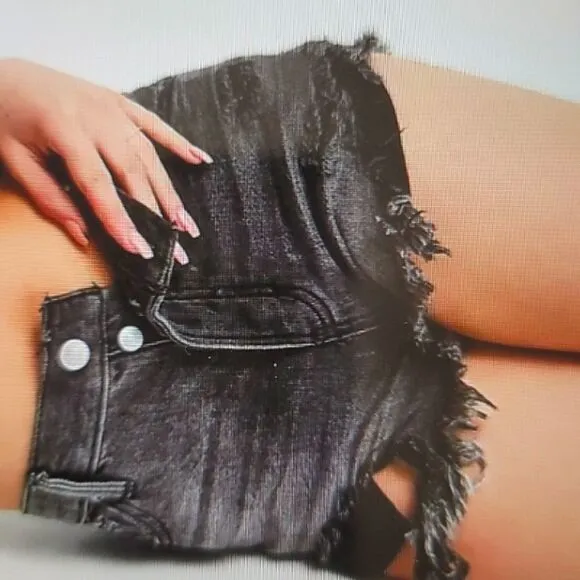 We the free black distressed shorts size 25