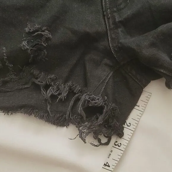 We the free black distressed shorts size 25