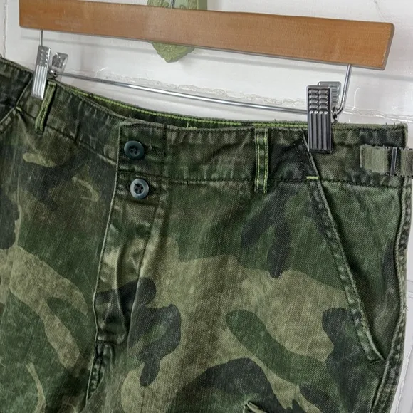 WE THE FREE BY FREE PEOPLE COMMANDER CUTOFF CAMO SHORTS
