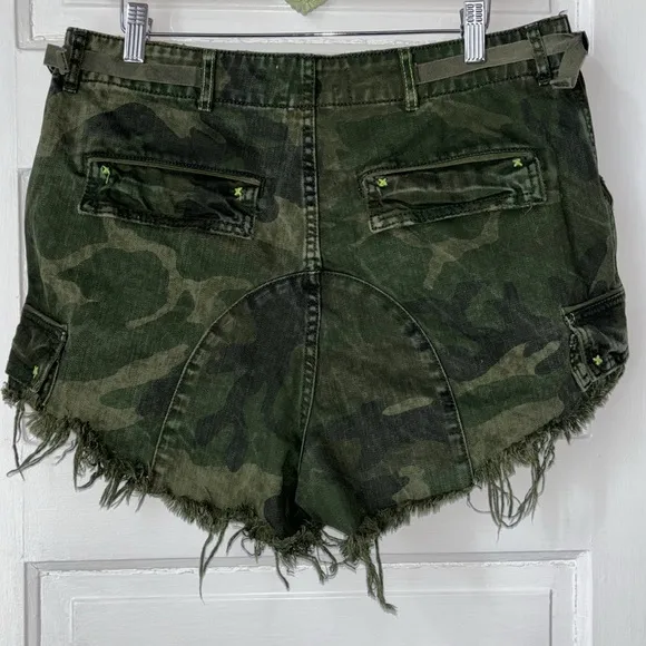 WE THE FREE BY FREE PEOPLE COMMANDER CUTOFF CAMO SHORTS