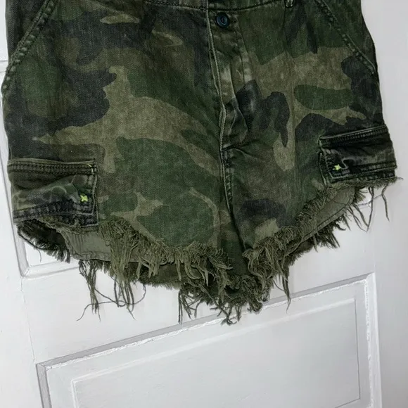 WE THE FREE BY FREE PEOPLE COMMANDER CUTOFF CAMO SHORTS