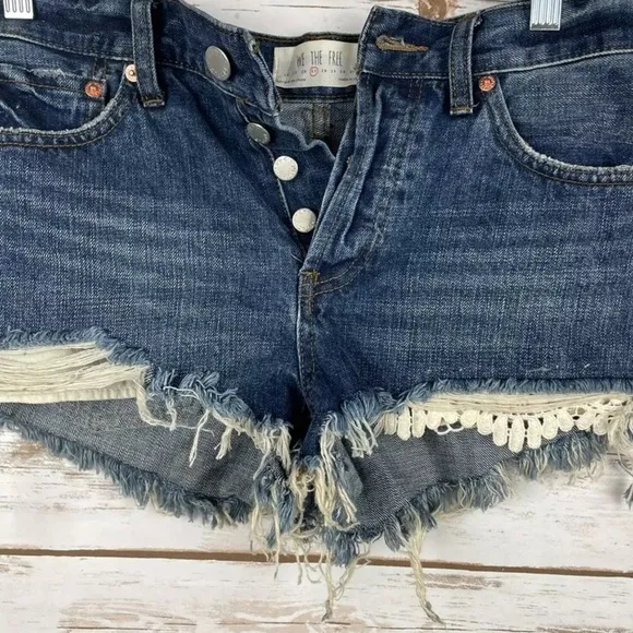 WE THE FREE Daisy Chain Lace Denim Shorts Distressed cut off jean shorts Fringe